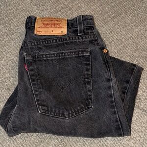 Levi's women’s Dark distressed black 550 Relaxed Jeans